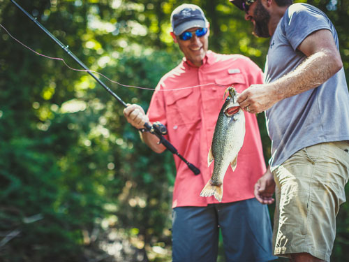 Two men bass fishing on Table Rock Lake in Branson.
