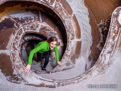 Girl climbing through a tunnel at Fritz's Adventure in Branson.
