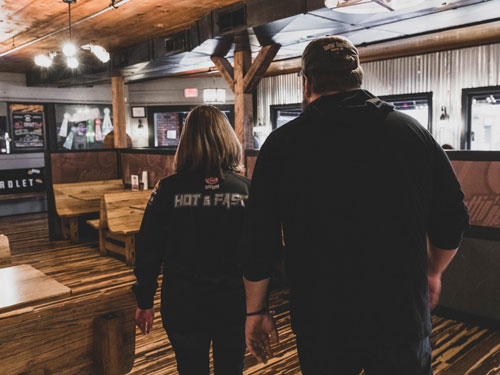 Husband and wife co-owners and chefs at a barbecue restaurant in Branson.
