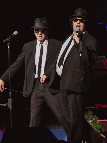 Blues Brothers tribute performing on a live show stage in Branson.