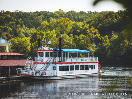 Large yacht boat floating on Lake Taneycomo in Branson.