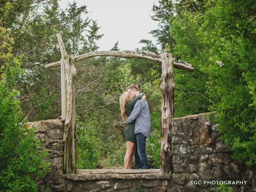 Recently engaged couple kissing at Lakeside Wilderness Area.