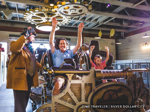 Father and son about to ride the world's tallest, fastest spinning coaster found in Branson.