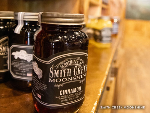 Bottled moonshine on shelves in Branson.