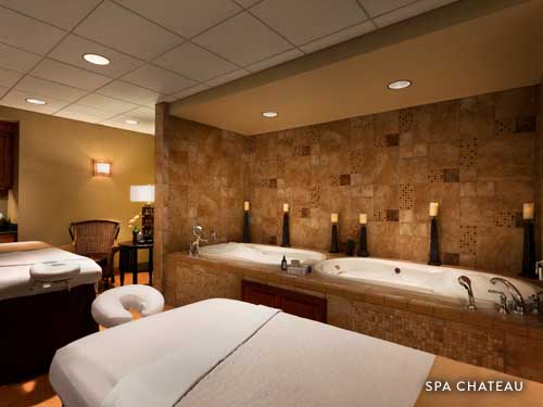 Hot tubs and massage tables for couple date night at Spa Chateau.