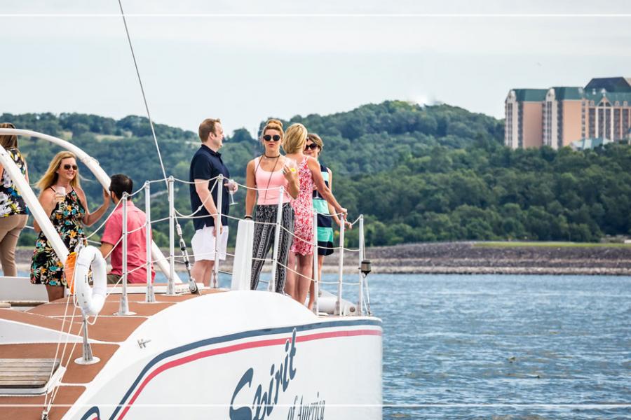 A group of people sailing on a boat.