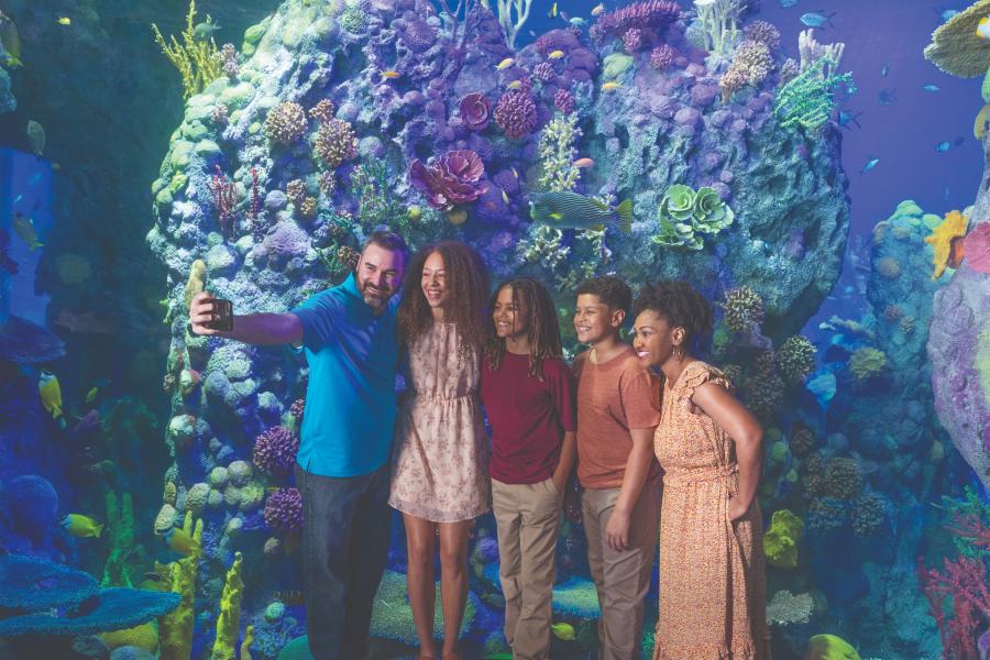 family taking photo at Branson Aquarium