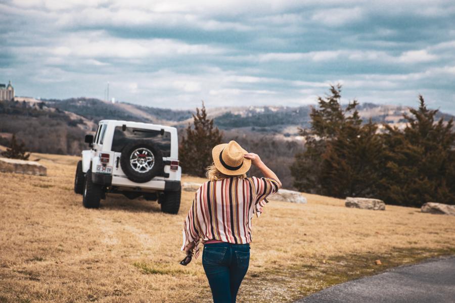 woman walking towards jeep