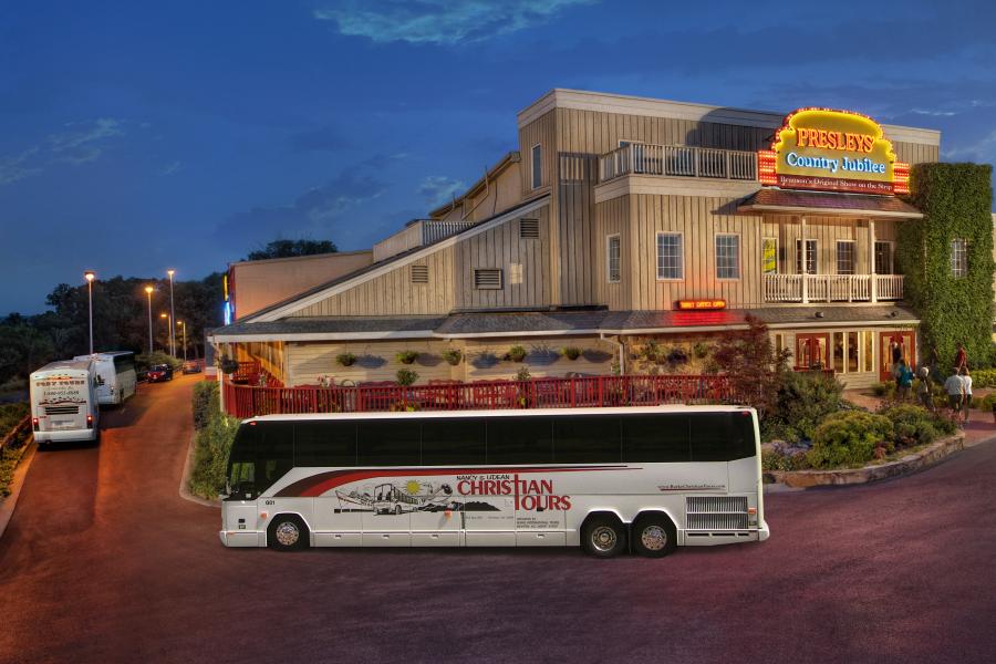 preselys theatre with group tour bus in front branson mo