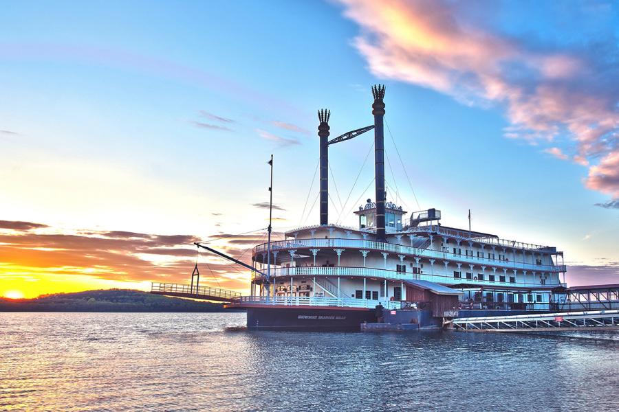 The Showboat Branson Belle waiting at the East Dock at Sunset. 