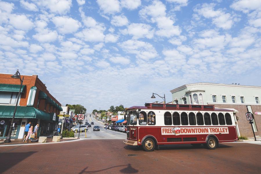 historic downtown branson with the infamous trolley passing by