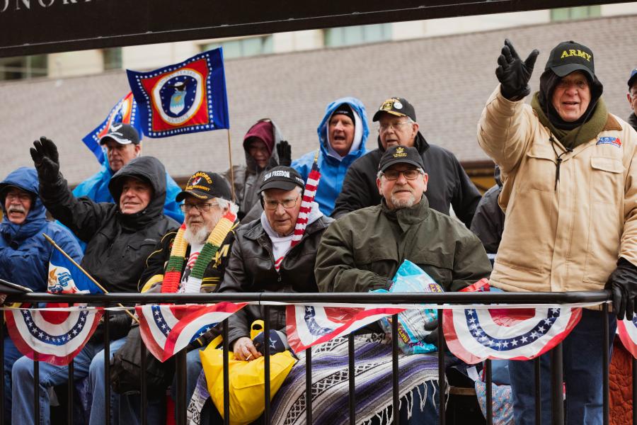 Veteran waves during parade in Branson