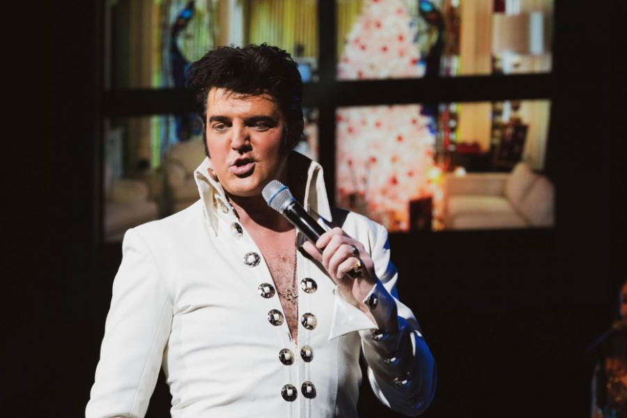 Elvis tribute performer in a live show in Branson.