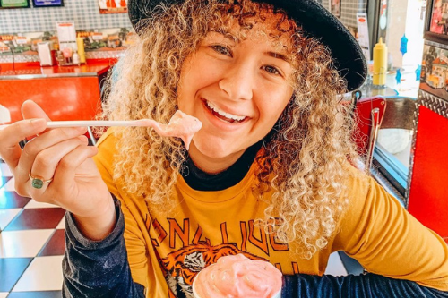 girl eating milk shake at billybob's dairyland diner in Branson MO
