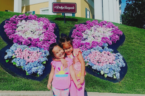 young sisters in front of dollys stampede branson mo