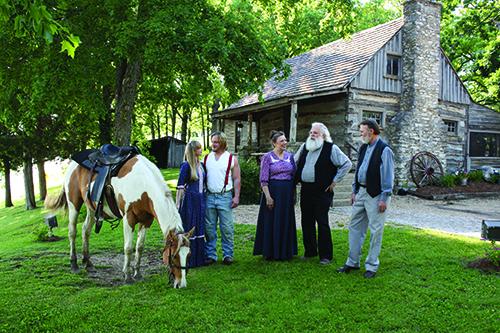 shepherd of the hills cast at old mats cabin in branson