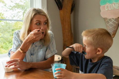 Mother and son eating ice cream at Sammy Lane at Shepherd of the Hills.