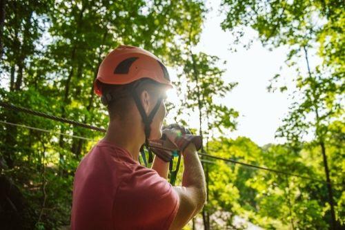 Man ziplining at Shepherd of the Hills.