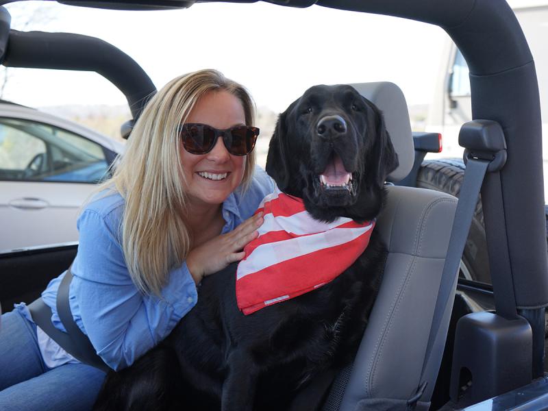 A woman and her dog on a road trip to Branson.