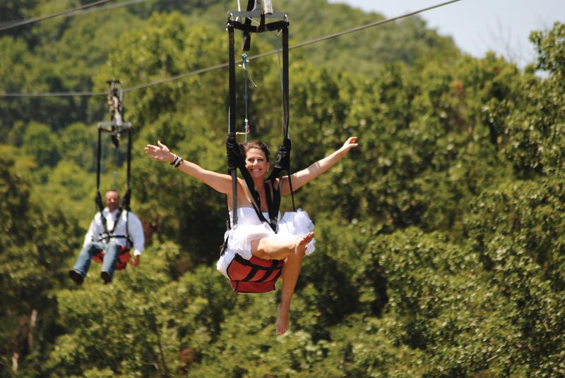 Fly through the trees as you ride on one of Branson's awesome zipline.