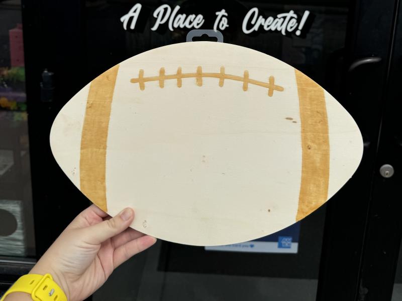 football wood cutout Hawaii Fluid Art