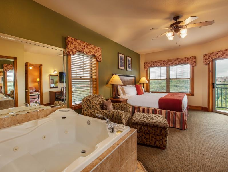 Interior of Westgate Woods hotel room. Has a large jacuzzi and a scenic view