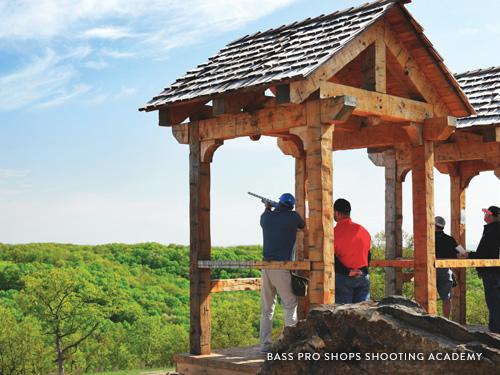 Group of men shooting guns at shooting academy in Branson.