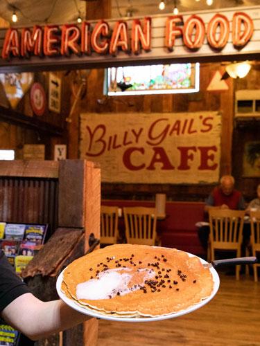 Pancake as large as a car hubcap being served at a small cafe in Branson.