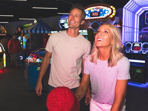 Man and woman on a date at an indoor arcade in Branson.