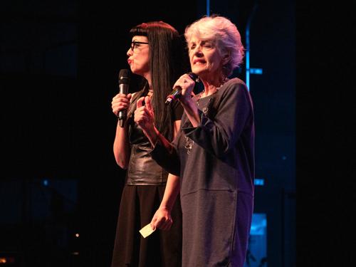 Two women performing on live show stage in Branson. 