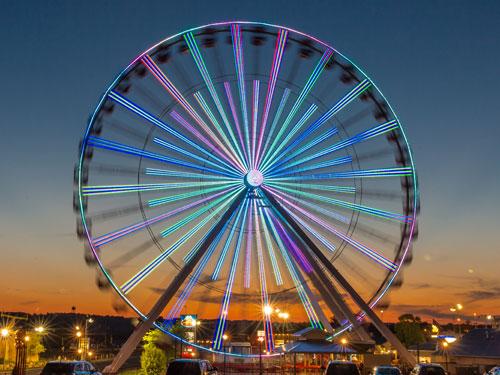 Branson Ferris Wheel lit up by 16,000 LED lights at night.