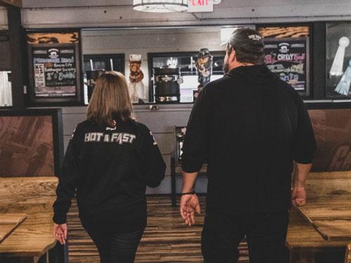 Husband and wife co-owners and chefs at a barbecue restaurant in Branson.