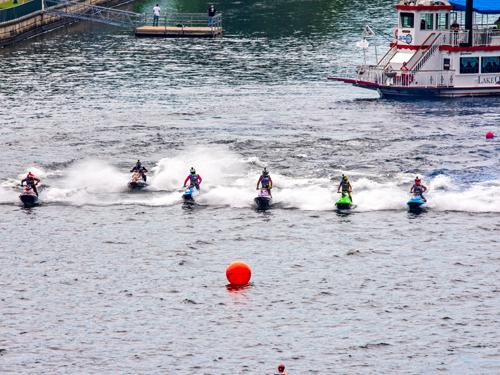 Six powerboat riders racing in a powerboat event on Lake Taneycomo in Branson.