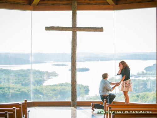 Man on one knee proposing to girlfriend.