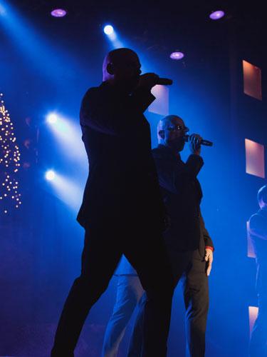 Two brothers performing a-capella songs at a live show in Branson.