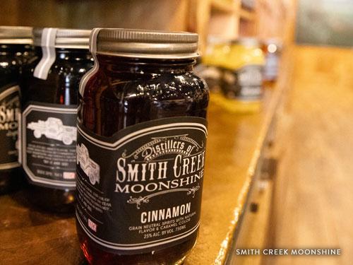 Bottled moonshine on shelves in Branson.