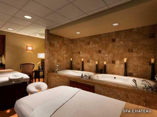 Hot tubs and massage tables for couple date night at Spa Chateau.