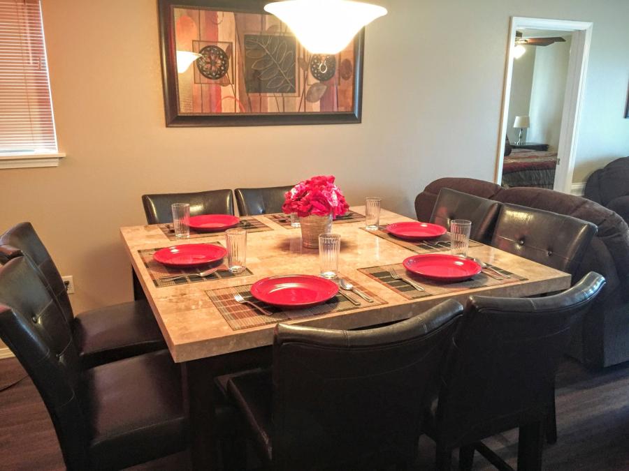 Dining table with 8 chairs.