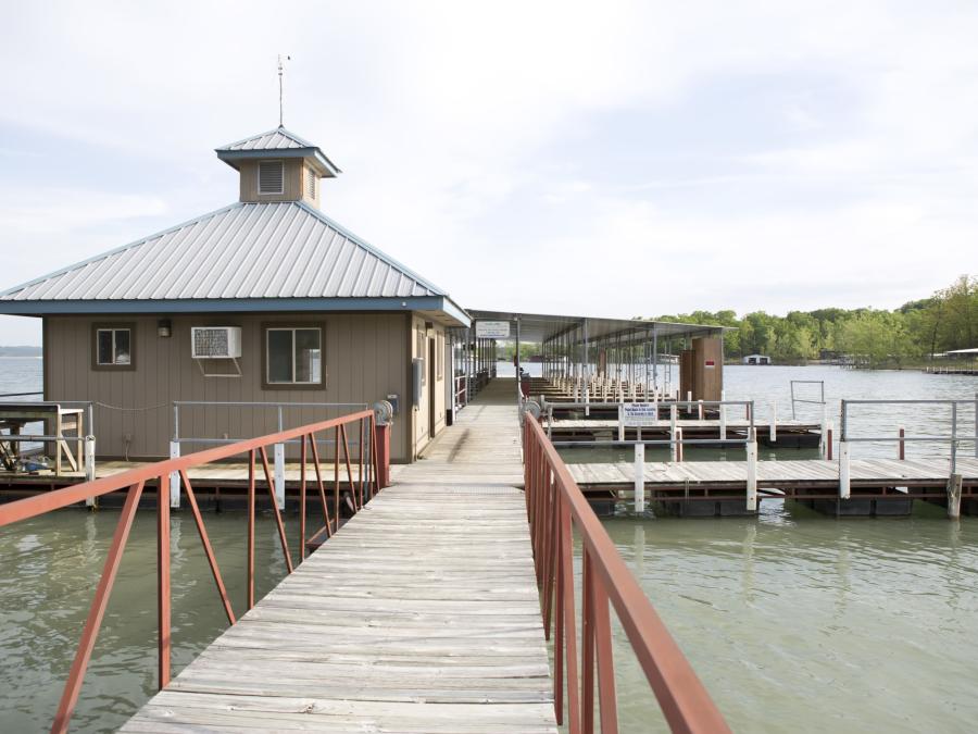 Gas Dock & Marina with 150HP Tri-Toons, Double Deck Slide Tri-Toons, Fishing Boats, Kayaks, and Paddleboards for rent or use.
