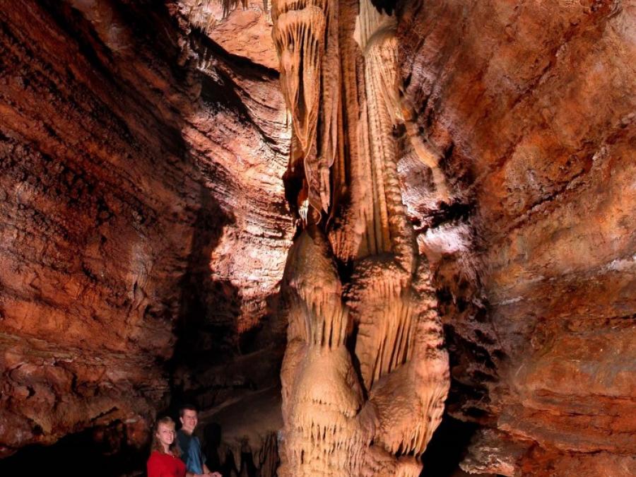 A group in awe of the Angel formation at Talking Rocks Cavern
