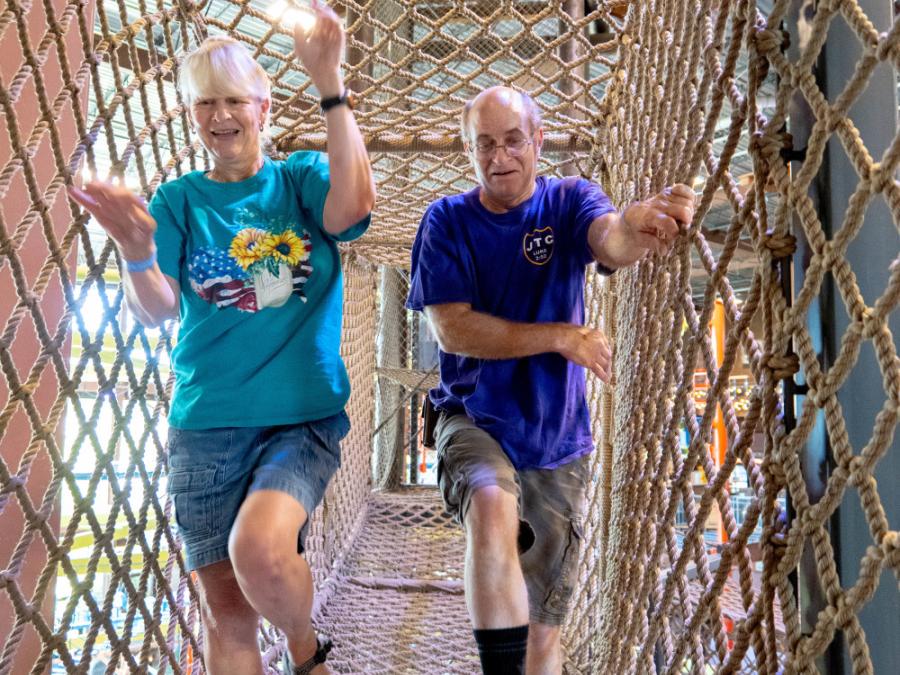 Connected by rope bridges, there are three vertical climbing tree houses reminiscent of Swiss Family Robinson.