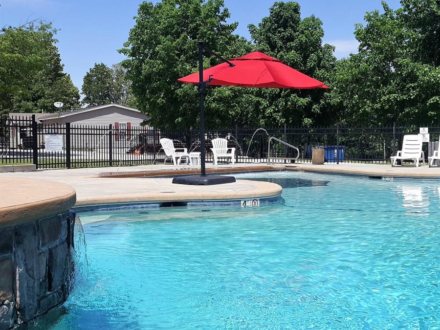 Sparkling pool fountains and 12-person hot tub