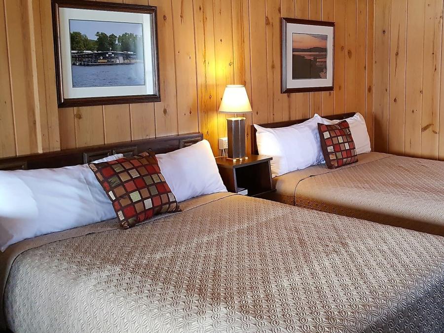 One room pinewood cabins with comfortable queen beds and contemporary touches.