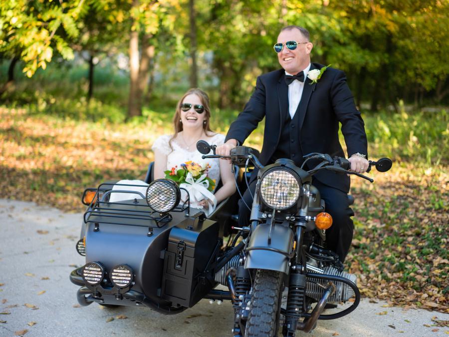 Bride and Groom on a Vintage Motorbike by Lana Raquel Photography
