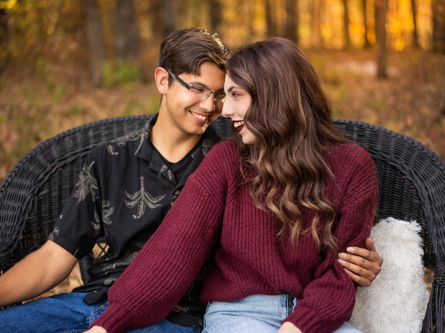 Couple Snuggles Up During Autumn In The Ozarks Photoshoot