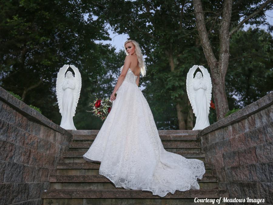 Bride on steps at Liberty Plantation Weddings and Events