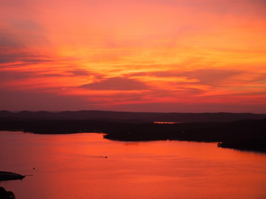 Watch the sunset over Table Rock Lake from a private mountain overlook