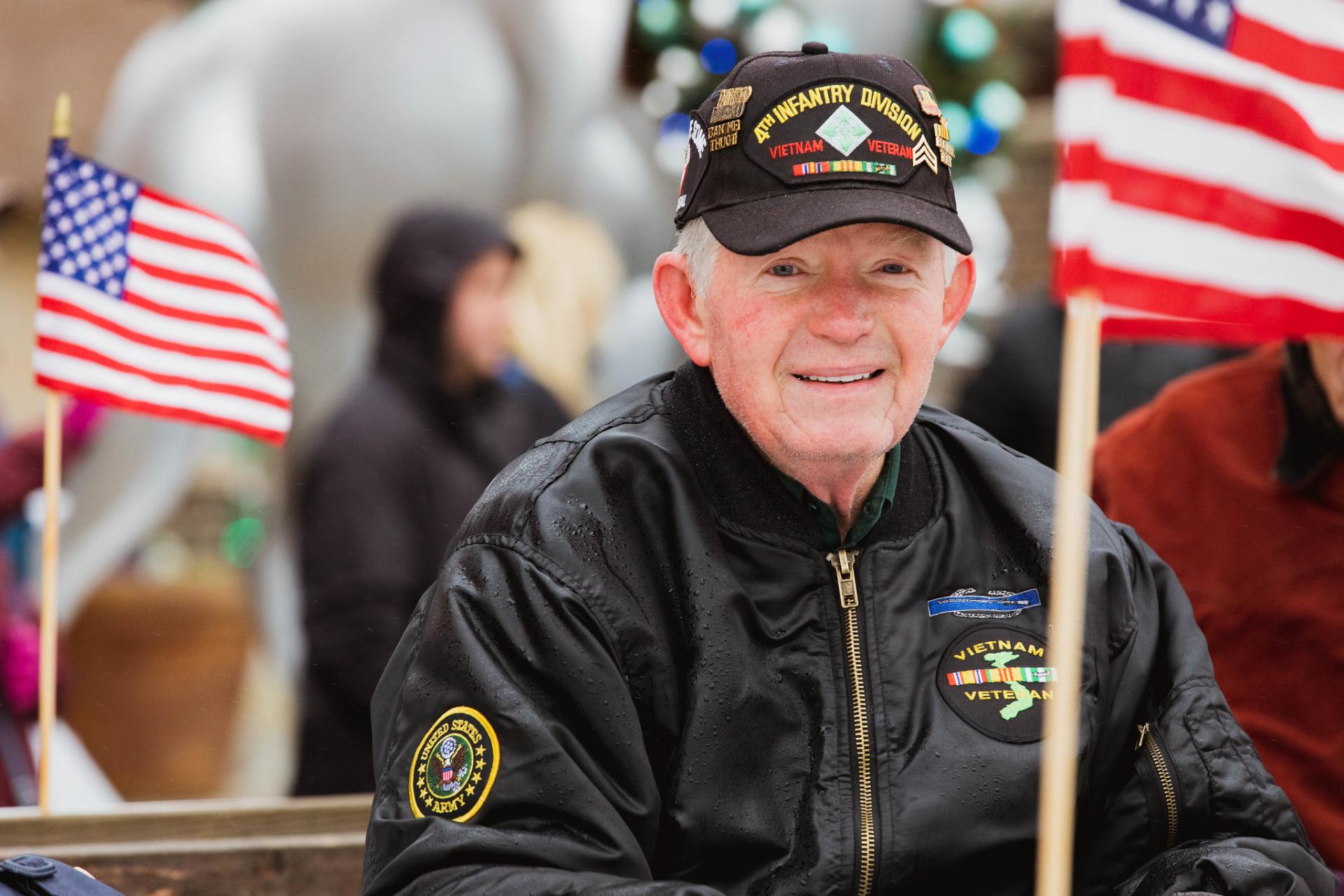 A veteran with American flags.