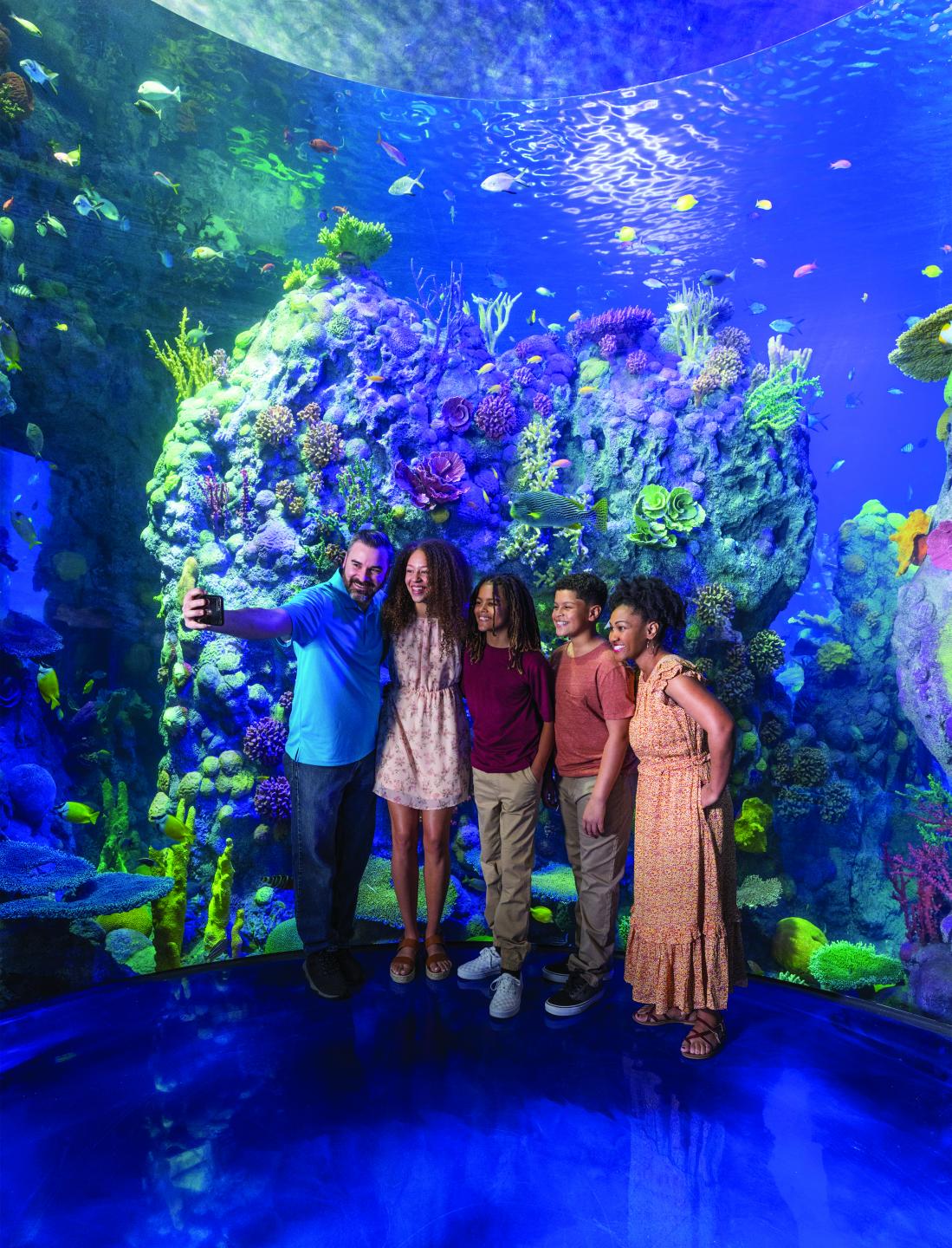 family taking photo at Branson Aquarium