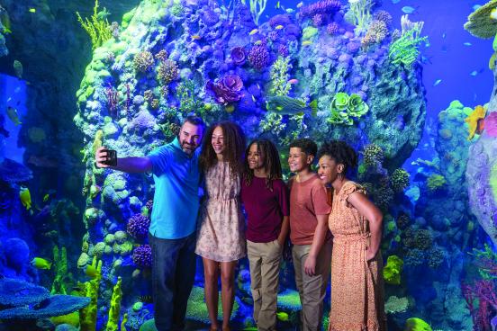 family taking photo at Branson Aquarium